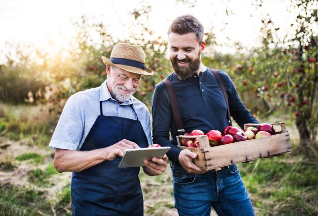 Ethics visual featuring two farmers 