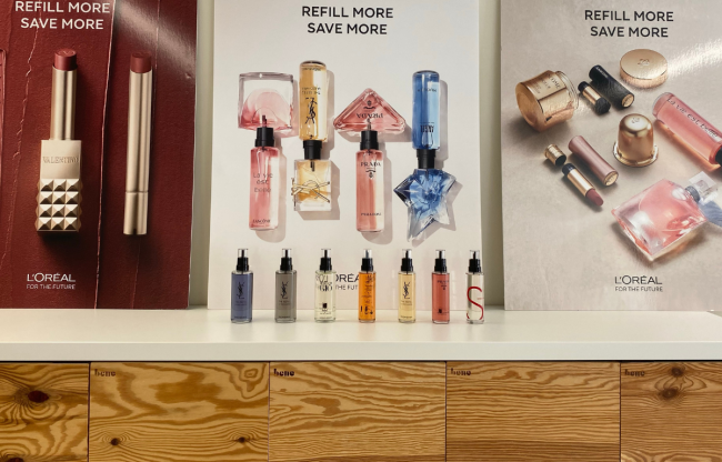 L'Oreal refill station featuring severals perfumes refills bottles at Lagard&egrave;re Travel Retail HQ